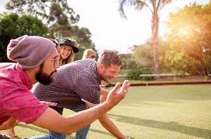 People playing a game of bowls